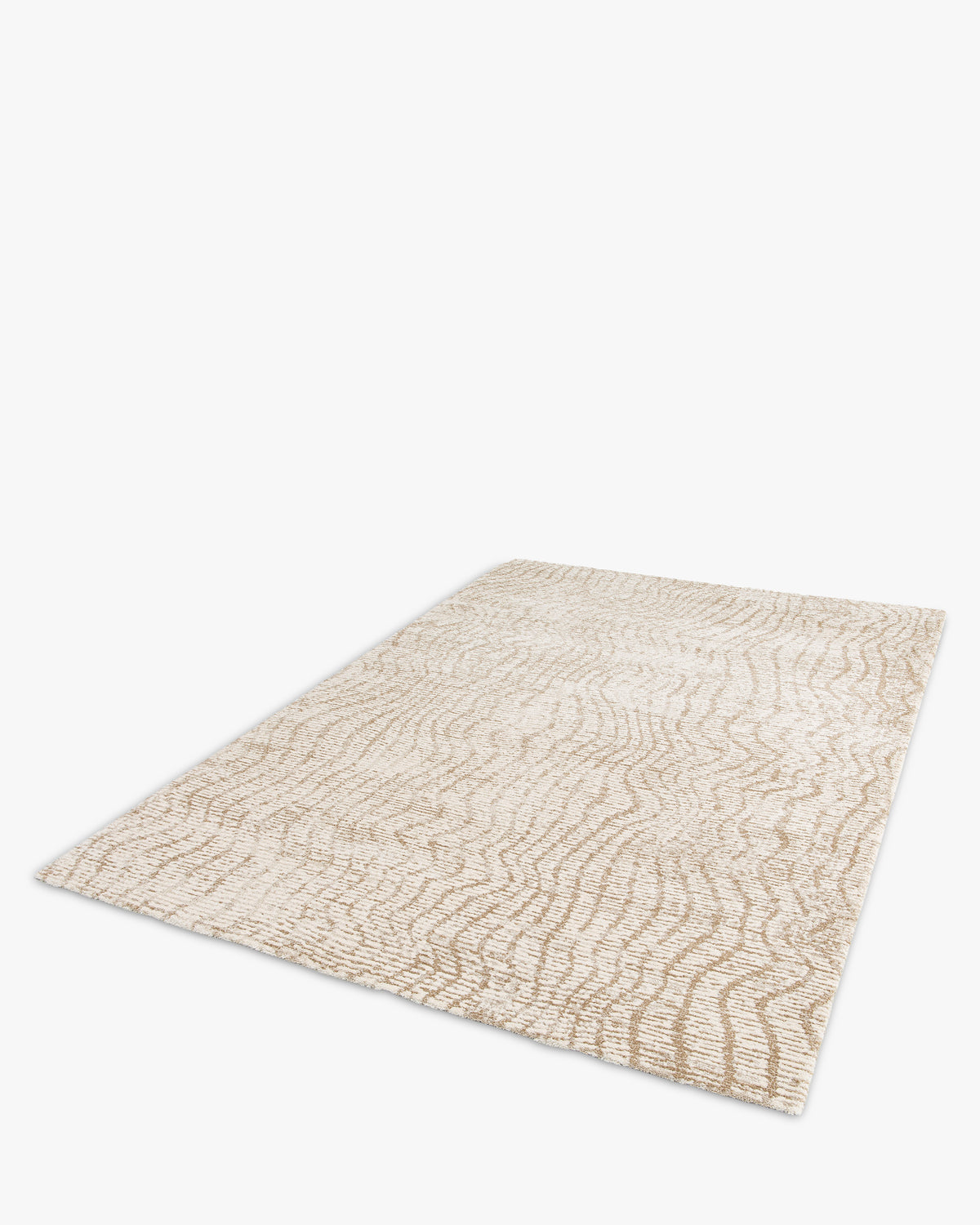 tapis de salon Cortex rectangulaire écru à motif ondulant sable - vue de trois quarts