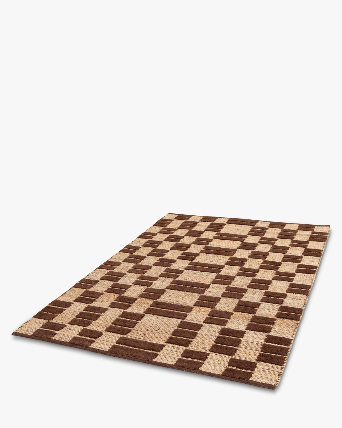 tapis de salon Saxton rectangulaire en jute et laine brune - vue de trois quarts